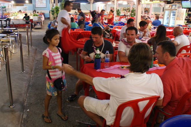 Child selling flowers