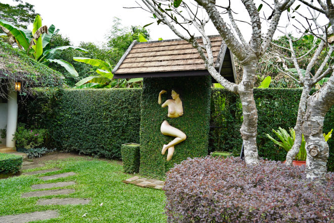 Woman in a wooden wall