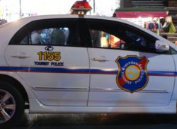 Getting help from The Tourist Police. The Tourist Police